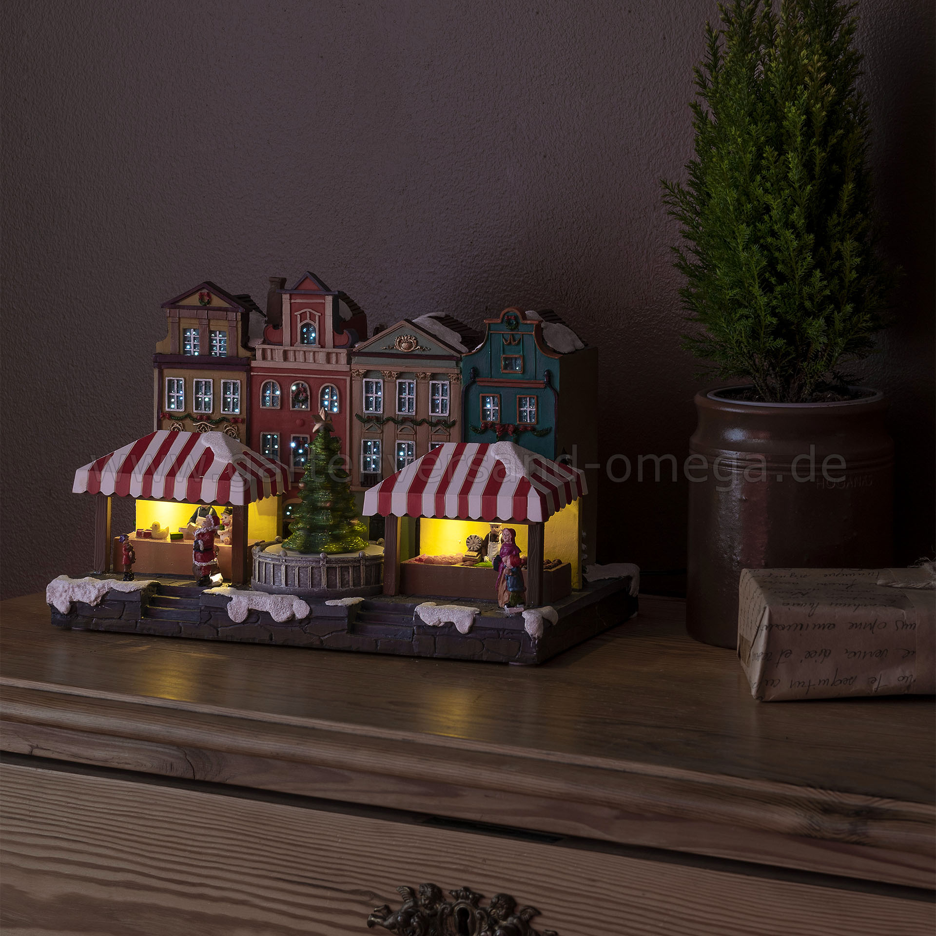 Anwendungsbeispiel LED-Fiberoptikhaus Stadtszene mit rotierendem Weihnachtsbaum